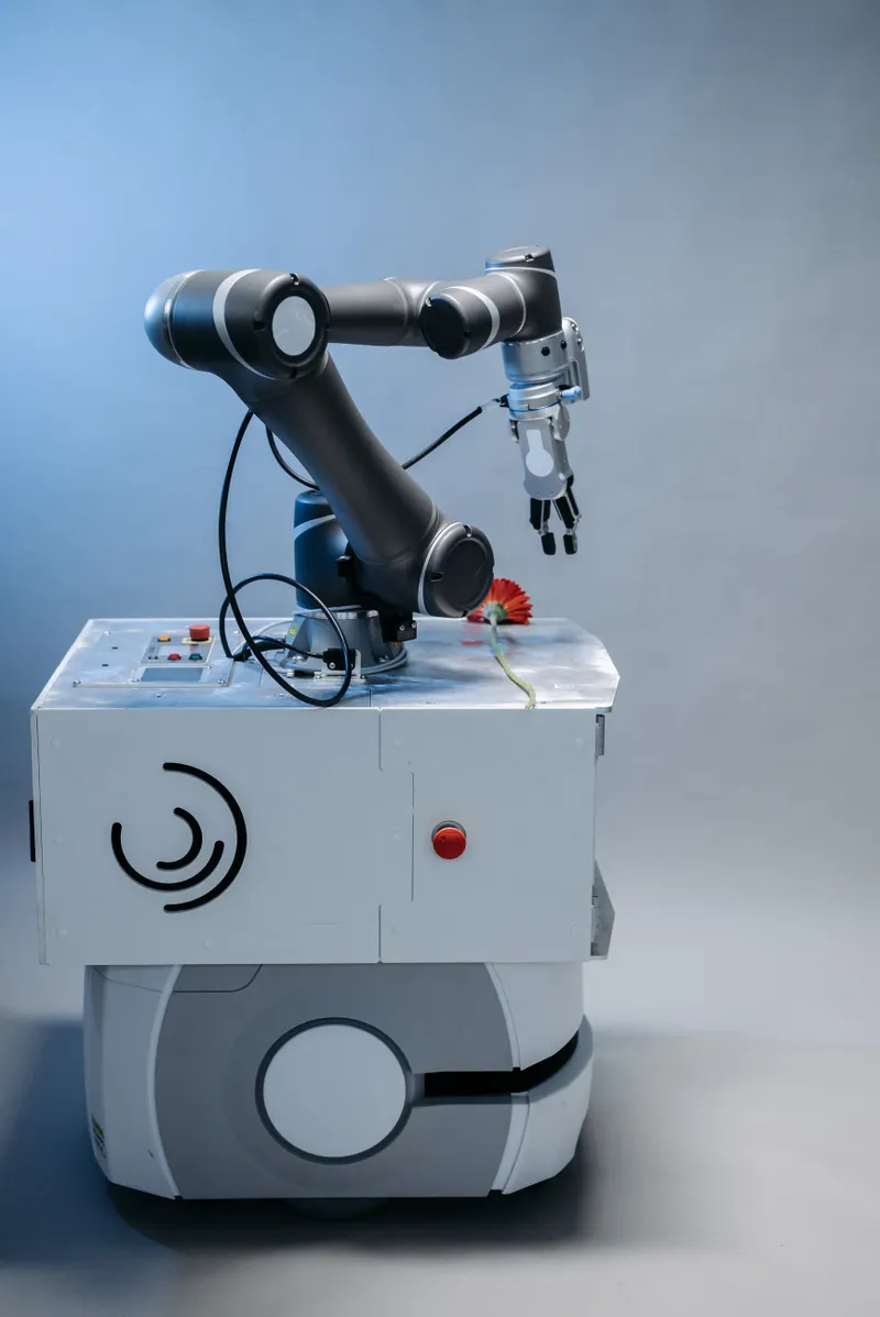 Robot arm in a modern laboratory representing artificial intelligence capabilities